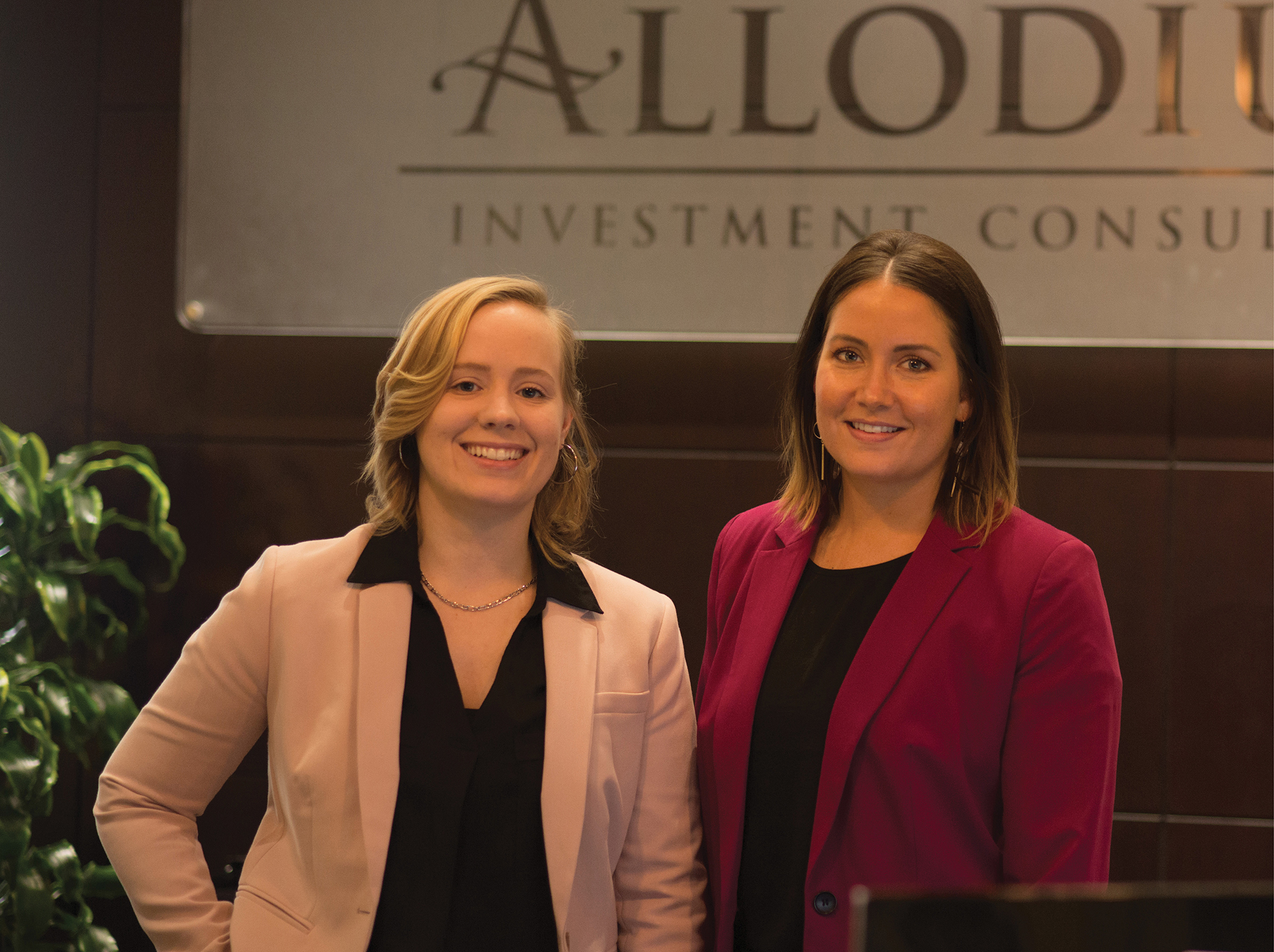 Two Allodium team members in the Allodium office