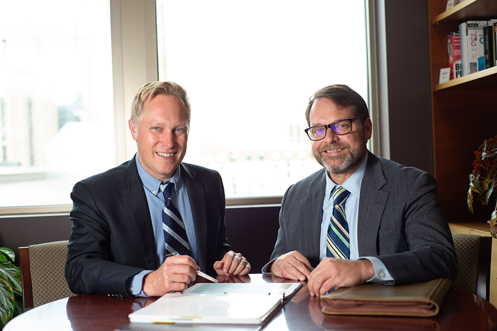 Allodium wealth advisors discussing investment management strategies
