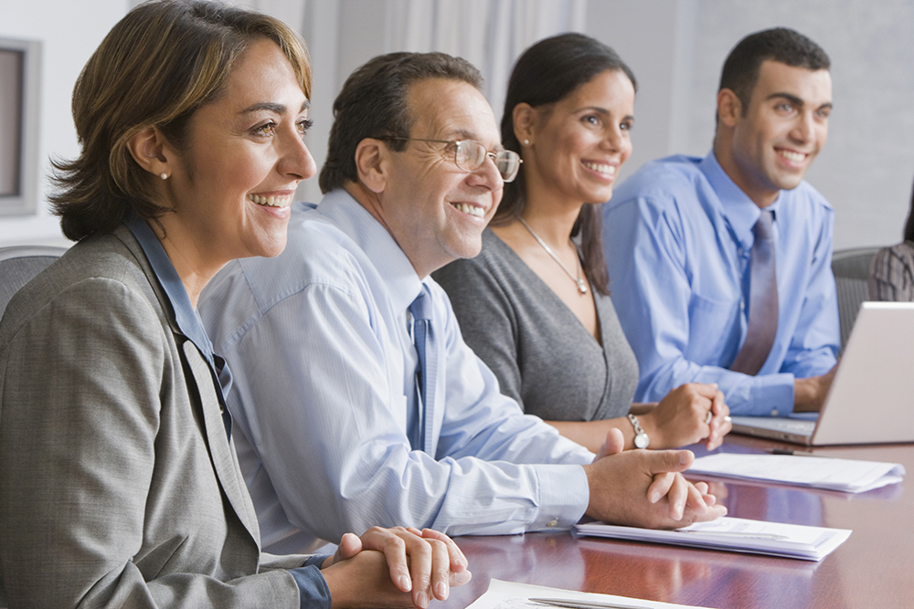 Consultants meeting with institutional clients to discuss investment strategy