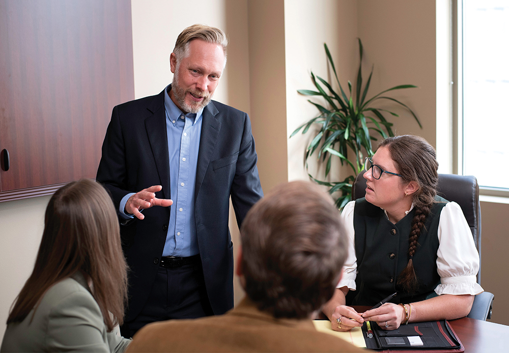 Advisors discussing financial planning.
